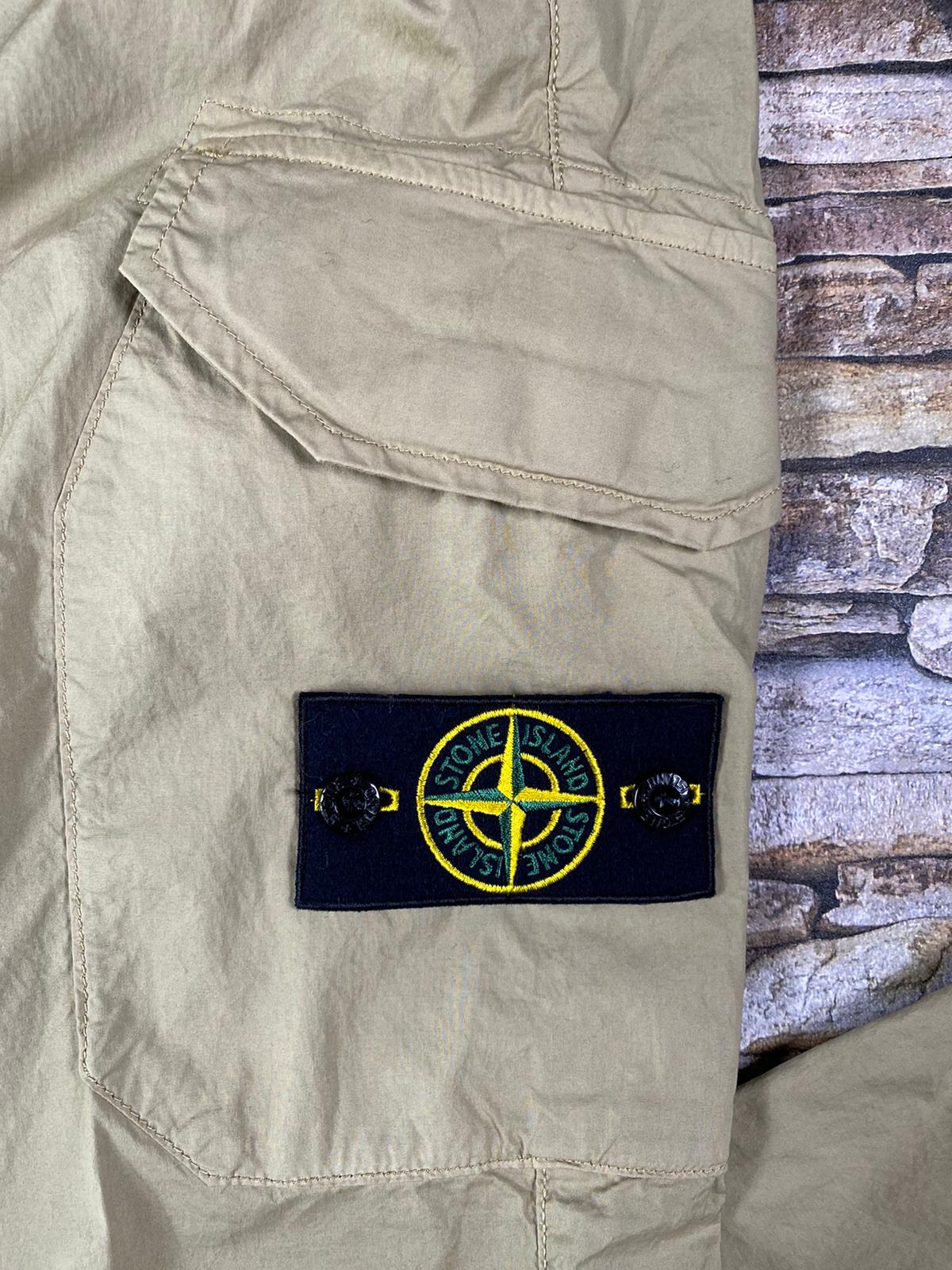 STONE ISLAND COMBAT RE-T TROUSERS - X Clothing