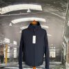 C.P. COMPANY LENS HOODED SOFT SHELL JACKET