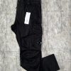 C.P. COMPANY STRETCH SATEEN LOOSE FIT UTILITY PANTS