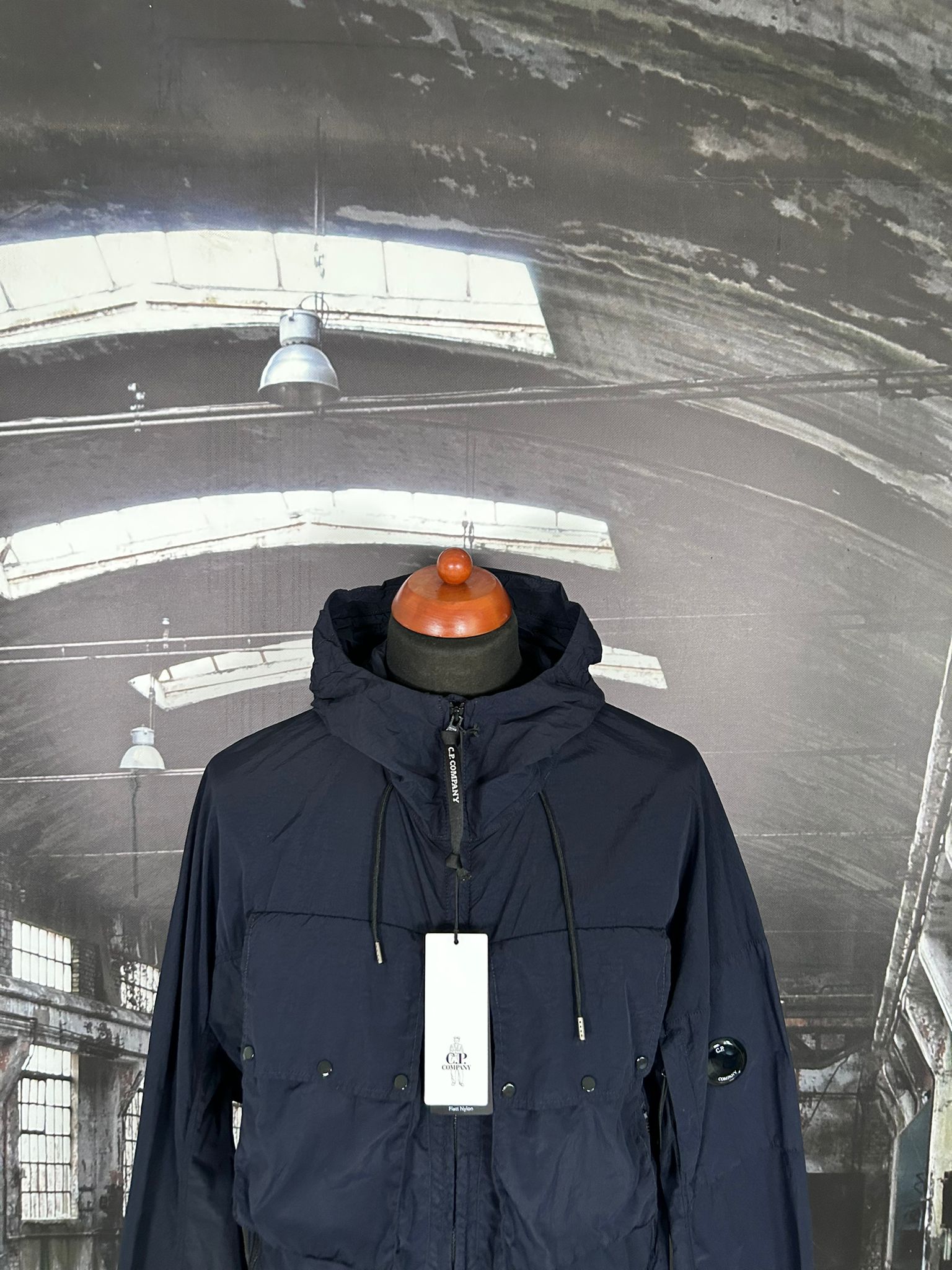 C.P. COMPANY FLATT NYLON LENS HOODED JACKET - X Clothing