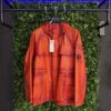 C.P. COMPANY BI FILM LENS HOODED JACKET